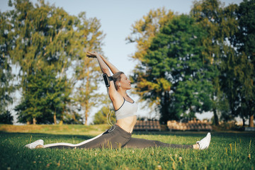 Woman doing yoga exercises in the park
