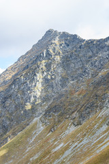 mountain tops in  autumn covered in mist or clouds