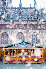 Christmas market under the snow in Strasbourg, Alsace, France