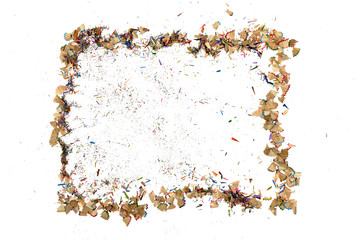 Photo frame made of shavings from a color pencils isolated  on a white background.