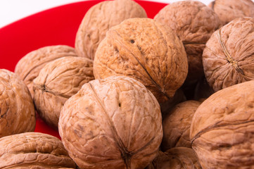 walnuts in red plate