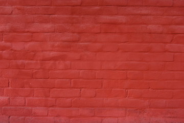Brick wall painted red for background or texture