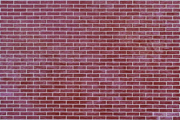 Texture of old red brick wall surface with cement and concrete seams