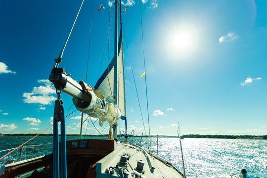 Fototapeta Yachting on sail boat during sunny weather