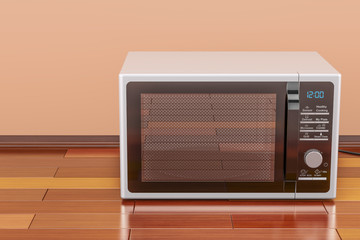 Fototapeta premium Modern Microwave in room on the wooden floor, 3D rendering