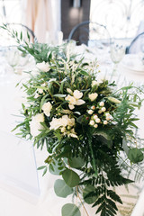 bouquet with white flowers, eucalyptus and greens