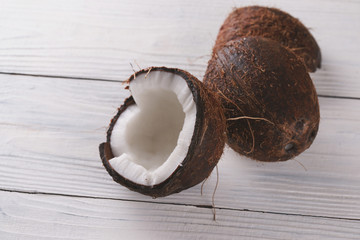 Coconuts on a wooden background