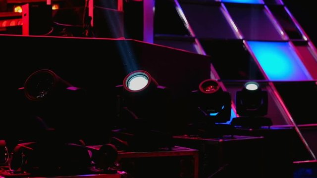 Working lighting equipment at the event on a stage