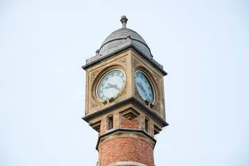 Fototapeta na wymiar The tower with clock of the main railway station - Gent-Sint-Pieters, Ghent, Belgium