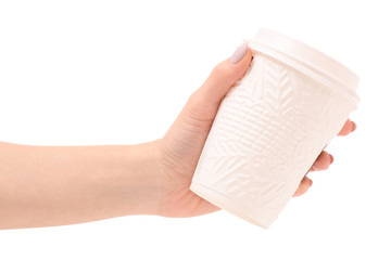 A cardboard cups of coffee snowning  winter Christmas with snowflakes in hand