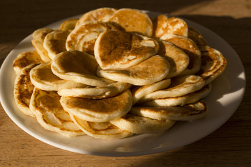 Homemade fluffy american pancakes prepared for family breakfast