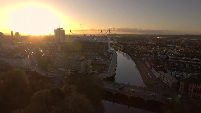 Aerial view of Cardiff city centre at sunrise.