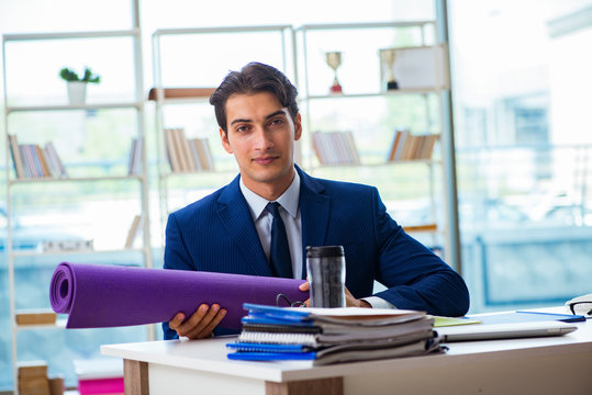 Man getting ready for sports break in the office