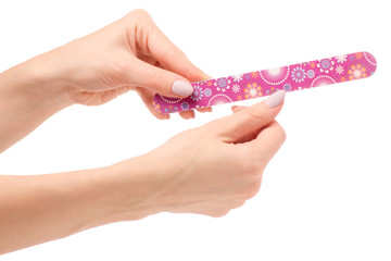 Female hands with a nail file in hands