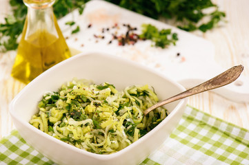 Vegetarian raw salad with leek, parsley, dill and olive oil.