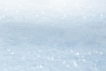Obraz premium Winter background. Sparkling snow with bokeh