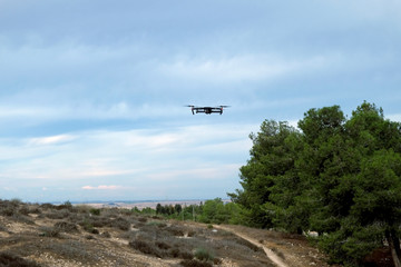 Fototapeta na wymiar Drone flies over uninhabited terrain