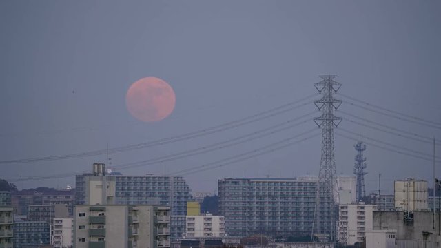Tokyo, Japan-December 3, 2107: Rising of the closest full moon was observed on December 3, 2017.