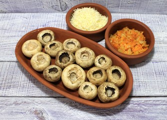Ingredients for dish mushrooms stuffed with vegetables and cheese