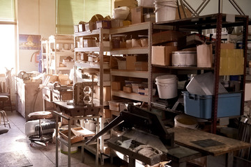 Messy warehouse room. Sunshine in a warehouse room.
