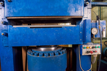 Hydraulic press machine. Factory equipment, control panel. Evolution of hydraulics.