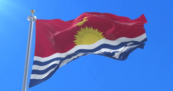 Flag of Kiribati waving at wind in slow in blue sky, loop