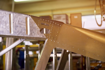 Steel with rivets. Airplane part close up.