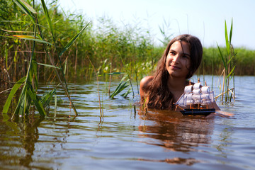 Fototapeta premium The girl and the boat