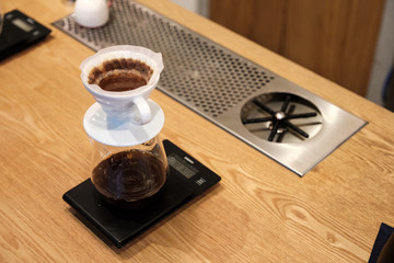 Drip Coffee, Brewed coffee is made by pouring hot water onto ground coffee beans, then allowing to brew