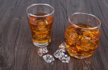 two whisky on the rock on wood and wood background
