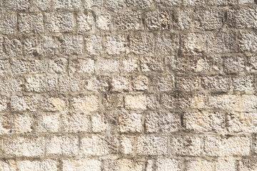 Old ancient wall brick vintage texture; outdoor background