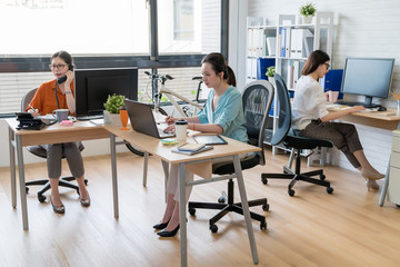 Creative Asia businesswoman team at work