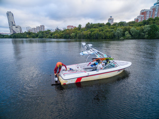 Fototapeta premium Waterskiing boat on river