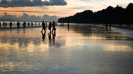 Beautiful Color in Sky during Sunset on a Busy Beach