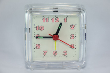 closeup photo of clock with isolated background