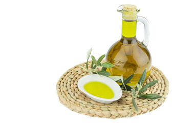 Olive oil Bottle and bowl plate with olive branch. Virgin olive oil. Natural olive oil, healthy food. Natural mediterranean food. Bread dipping.