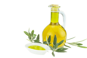 Olive oil Bottle and bowl plate with olive branch. Virgin olive oil. Natural olive oil, healthy food. Natural mediterranean food. Bread dipping.
