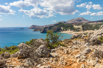 Naklejka na ściany i meble Coastline landscape from the Tsambika mountain on the Rhodes Island, Greece