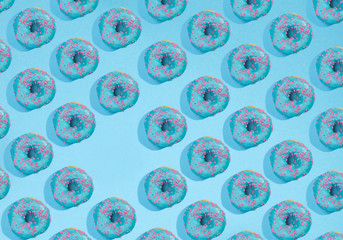 Collage and background of donuts covered with sweet glaze on a blue background