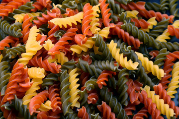 Fototapeta premium colored dry uncooked vermicelli pasta