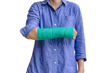 worker woman accident on arm with green cast isolated on white