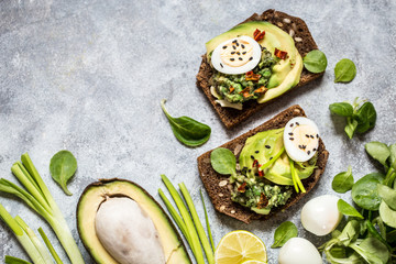 Meksikanskaja eating guacamole sandwiches guacamole of avocado, greens, egg, spices