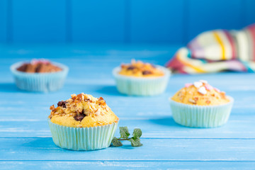 Fresh muffins with nuts and chocolate