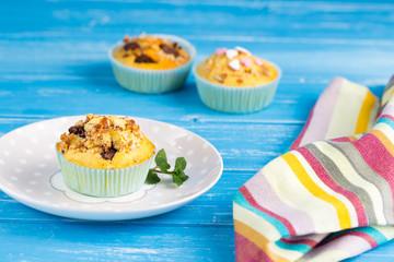 Fresh muffins with nuts and chocolate