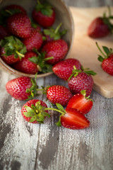Strawberry In a bowl On a Wooden Background