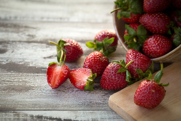 Strawberry In a bowl On a Wooden Background