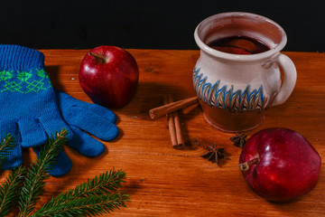 Red boiled wine on rustic wooden table