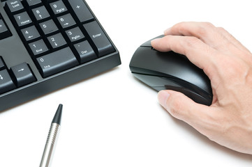 Computer keyboard and pen, hand holding mouse  isolated on white background
