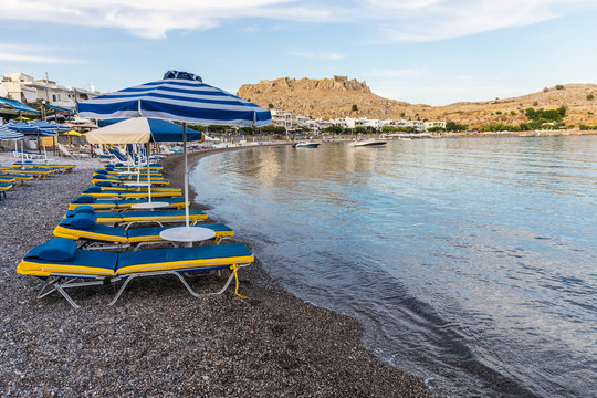 Haraki beach with quiet with crystal clear waters and boats, Rhodes, Greece
