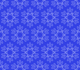 Seamless snowflakes background on dark blue background